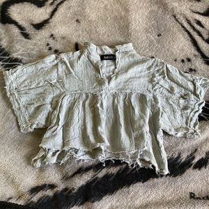*Sold* Fab’rik distressed top size S